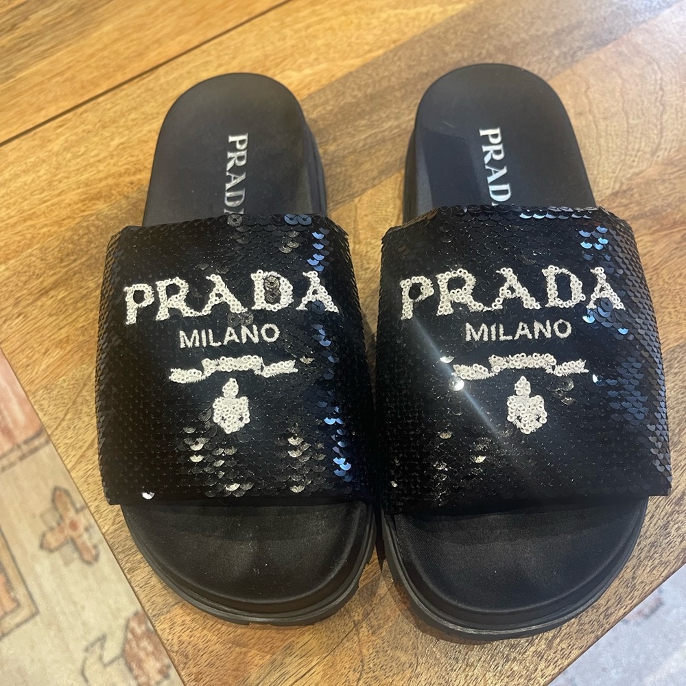 Prada sandals. Black. Never worn. Comes with box and duffel bag